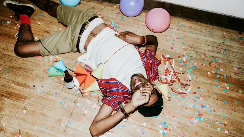 what is carnality showing a man on the floor with a bottle of alcohol