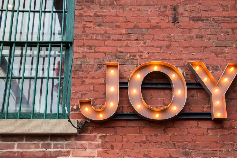 wonders joy showing letters of joy on a wall