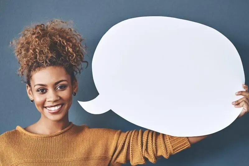 words build or destroy showing a womanw with a word bubble
