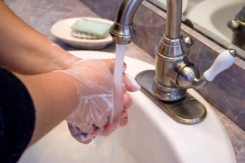 you are washed showing a man washing his hands